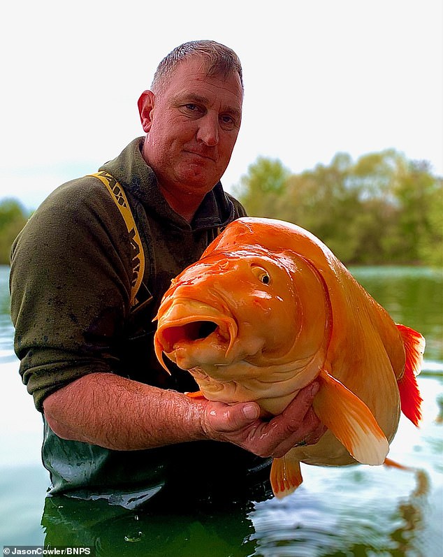 The father-of-two from Kidderminster, Worcestershire, spent 25 minutes reeling in the five stone fish