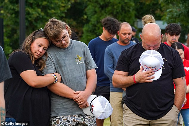 Families gathered Wednesday night to mourn the four victims of the senseless shooting