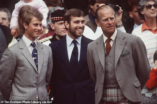 Bearded Prince Andrew stands between his brother Prince Andrew and father Prince Philip during their summer holiday in Scotland, August 1983