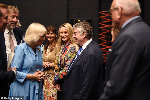 The Queen, a lover of dance 'in whatever form' and a practitioner of it, greeted the members of the organization with a smile