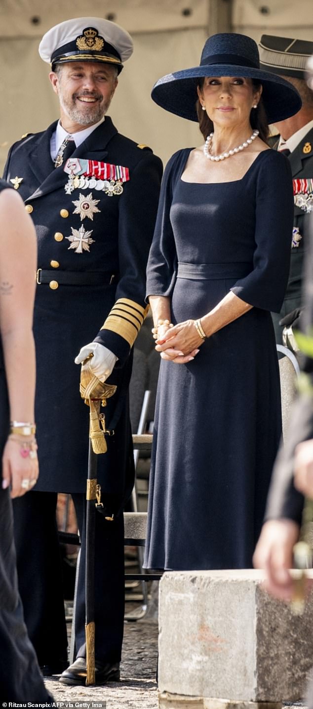 Mary paired her ensemble with a delicate oversized pearl necklace and matching earrings, along with a bracelet