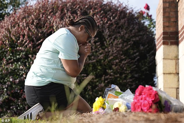 On Thursday, families and students stood at the somber scene to pay their respects to the lives lost in the tragedy