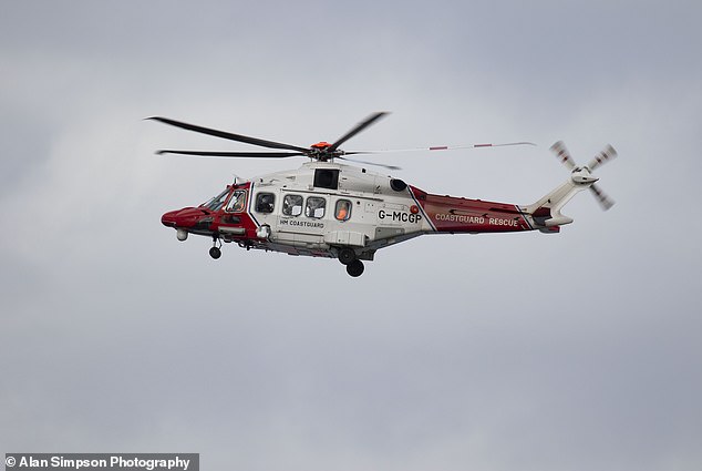 A large-scale search and rescue operation was launched after Jenny was unable to reach the Wardie Bay shoreline with the rest of the group (pictured: a helicopter flying overhead)