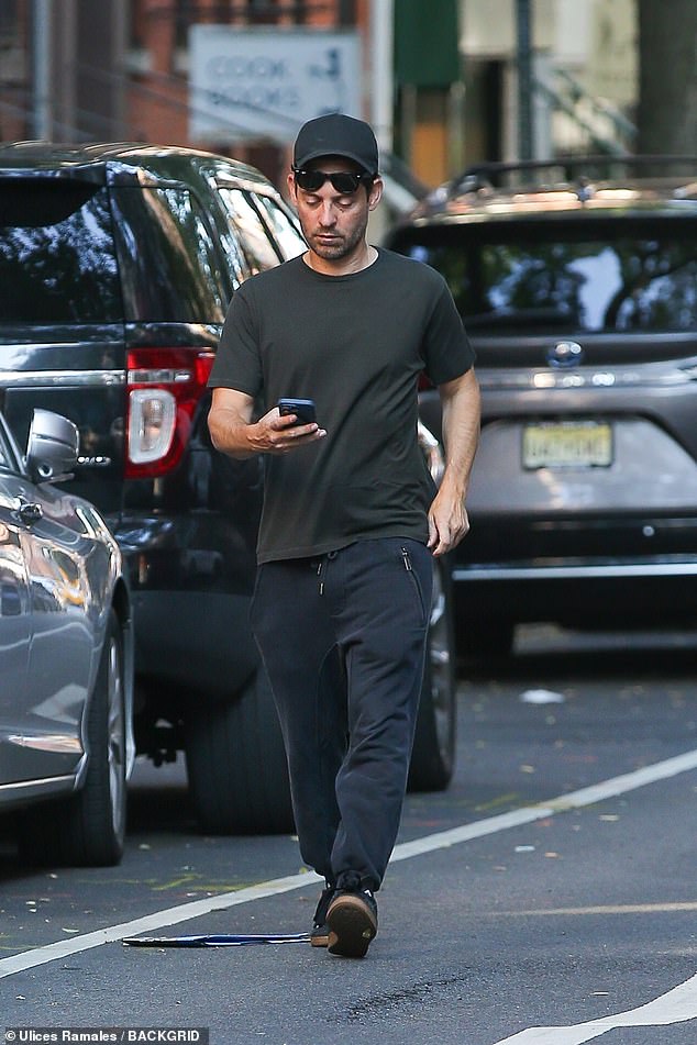 The Babylon actor wore a black T-shirt with a black cap, sunglasses and navy blue pants with black sneakers