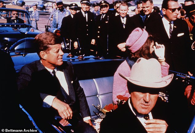 For years, many have questioned the official story of what happened in Dallas on November 22, 1963. JFK and Jackie Kennedy are pictured moments before he was assassinated.