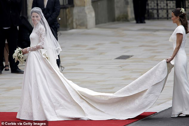 Pippa holds Kate's train as her sister arrives for her wedding to Prince William at Westminster Abbey in April 2011