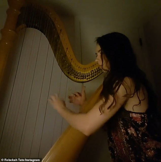 Tate is pictured playing the harp in a video on her Instagram page