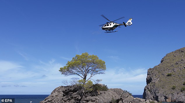 Helicopters (pictured above on September 5) were deployed in the search, as authorities believe the man was swept away by the floodwaters while trying to rescue his girlfriend.