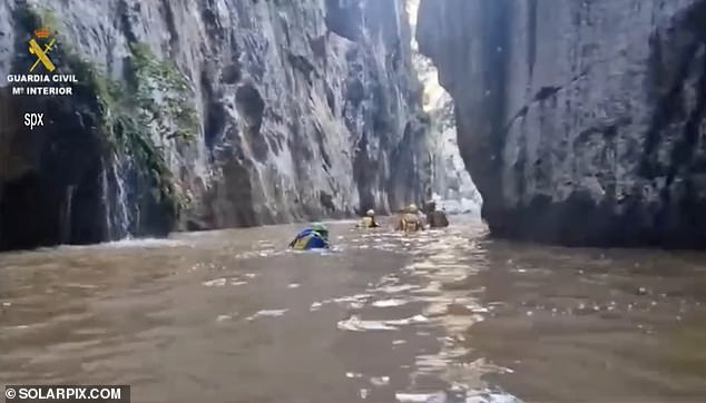 Rescue teams waded through river waters yesterday in an attempt to find the missing British tourist