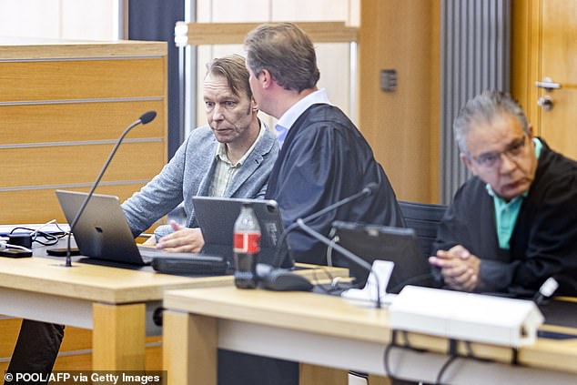 Suspect Christian B (L) is seen next to his lawyer Friedrich Fuelscher (C) and Atilla Aykac as he arrives for a hearing of his trial at the court in Braunschweig, northern Germany, on September 5, 2024.