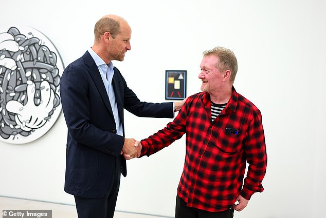 Prince William was reunited with Dave Martin, a Big Issue salesman with whom he has become good friends