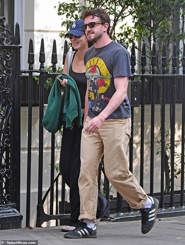 The couple looked happier than ever as they were snapped giggling and laughing during their outing