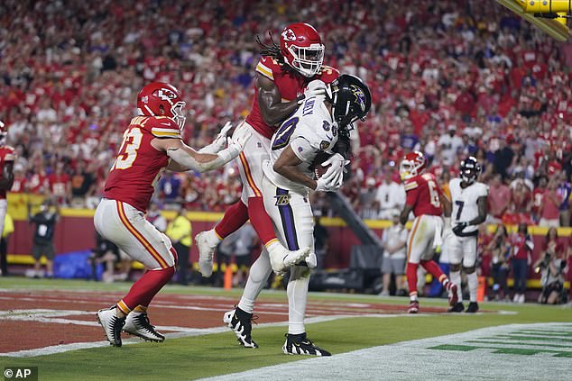 Baltimore Ravens tight end Isaiah Likely (80) catches a pass with his toe out of bounds