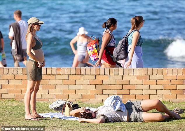 Pat looked very relaxed as he lay down and enjoyed the sun's rays during the sultry day out