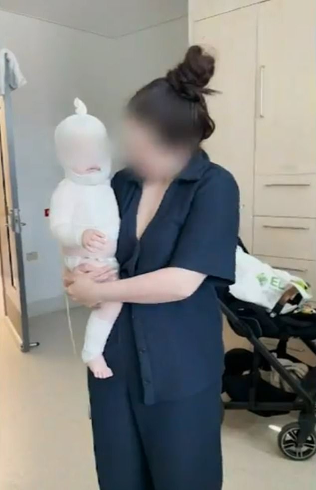 The baby's mother (pictured with her son) suffers from panic attacks instead of the attack