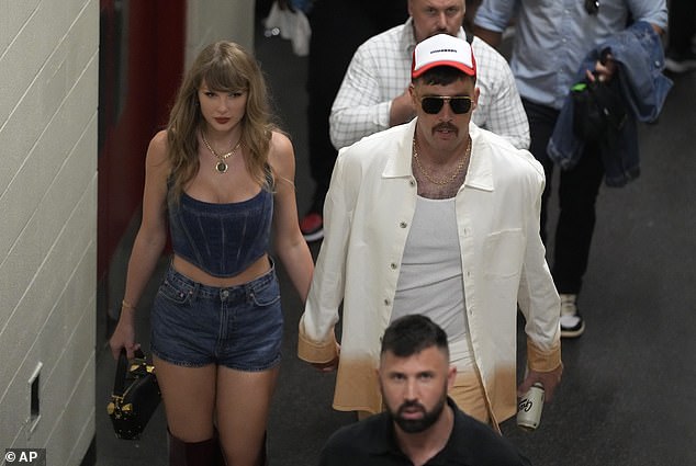 Travis Kelce and Taylor Swift were seen holding hands as they left Arrowhead Stadium following the Kansas City Chiefs' win over the Baltimore Ravens