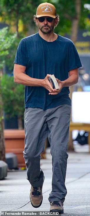 Despite having no company on his final walk, Bradley made sure to entertain himself on his last outing by bringing a book