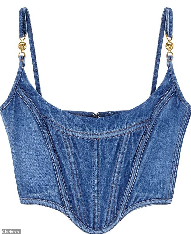 The denim corset was made by Versace and featured gold hardware along the straps