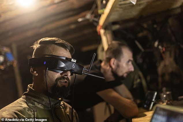 Ukrainian soldiers fly an FPV drone towards Kreminna, Luhansk Oblast, Ukraine, on August 25, 2024