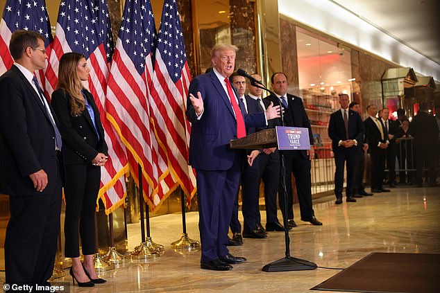 Trump stood with his legal team in the lobby of Trump Tower on Friday before heading to North Carolina for a campaign event