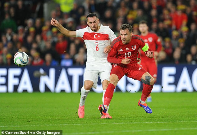 Aaron Ramsey (right) was one of the players who missed good chances for Wales