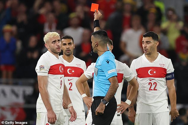 Wales had hoped the red card given to Baris Alper Yilmaz (left) would give them a path to victory