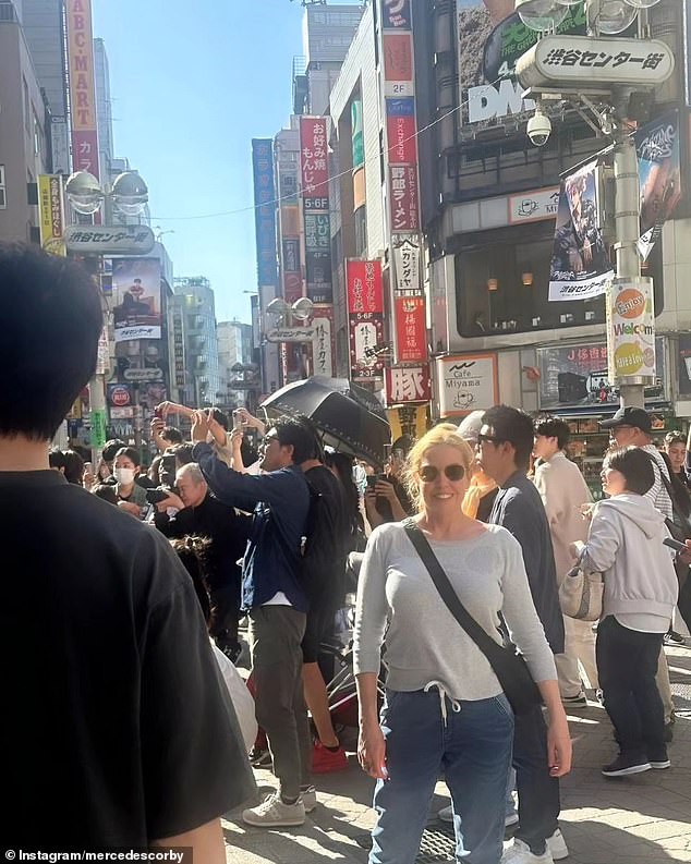 Photos showed the couple taking in the sights of Tokyo's bustling Shibuya and Harajiku districts