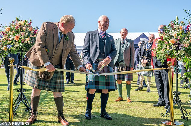 King Charles uses garden shears to officially open the Royal Horticultural Society of Aberdeen's 200th flower exhibition on August 31