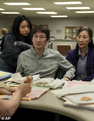 Quan starred in the critically acclaimed 2022 science fiction comedy Everything Everywhere All at Once as Waymond Wang (center)