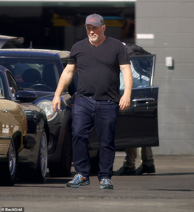 The 57-year-old Friends star appeared to be in good spirits during his visit to a car showroom in Van Nuys, just outside the city