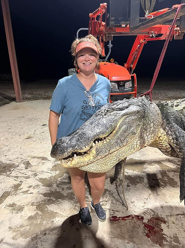 Brandi Robinson (pictured), also part of the winning team, explained that the giant alligator was spotted 750 feet away from the boat