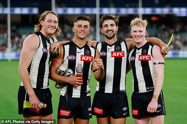 Murphy, left, won a championship with the Collingwood Magpies but was forced to retire early