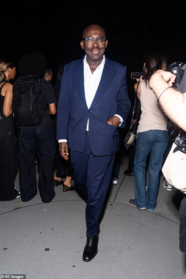 Former British Vogue editor-in-chief Edward Enninful, 52, was also in attendance at Friday's show, looking dapper in a navy suit