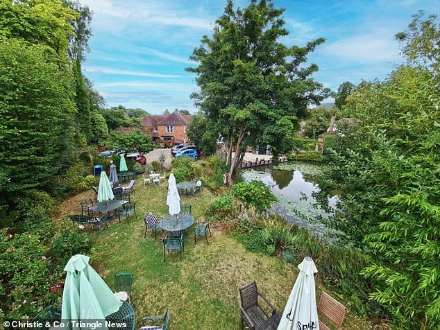 Outside the pub has a pub garden overlooking the village church and a large carp pond