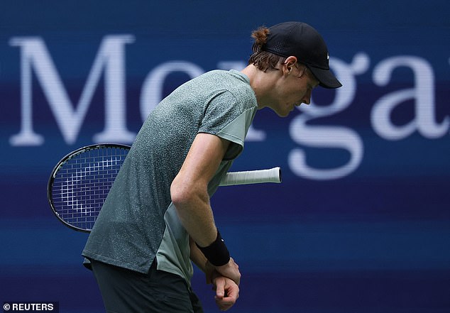 The Italian was caught grabbing his wrist at several points during the second set