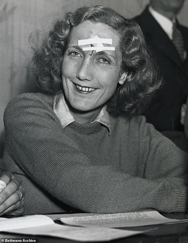 Beryl Markham is seen with a taped cut on her head that she sustained when her plane crashed in Nova Scotia after crossing the Atlantic Ocean