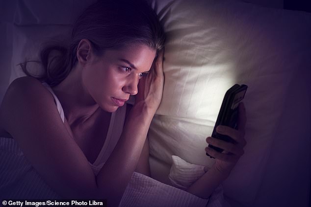 Limiting the time people spend on their cell phones can help with anxiety and depression (photo posed by model)