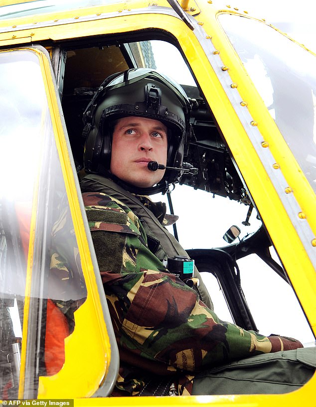 William pictured was at the controls of a Sea King helicopter during a training exercise in March 2011