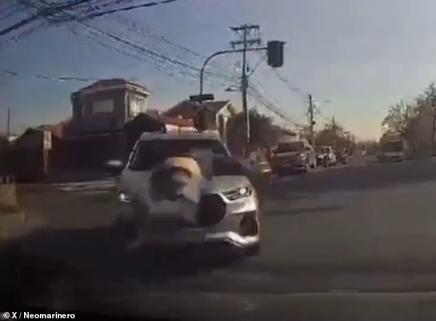 A dashcam in a car captured the moment a parent was run over by an SUV driven by a boy who had fought with his son at their school