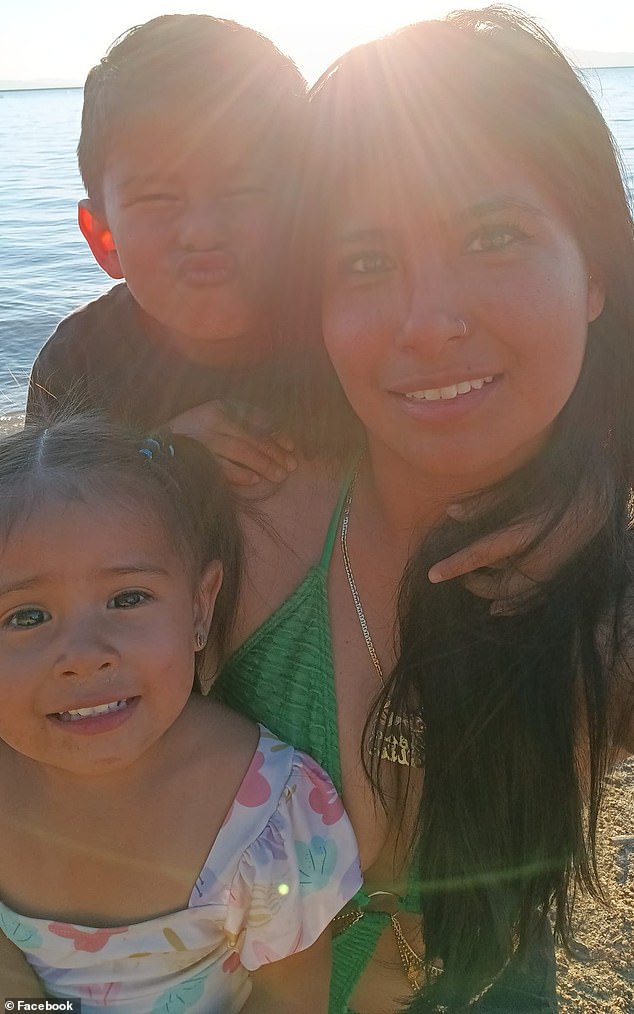 Ibarra on the beach with her two eldest children in one of two photos left on her social media