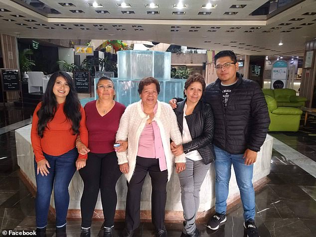 Ibarra (left) with her mother and other family members