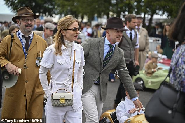 The star appeared in good spirits at the fun day out as she and Red Bull F1 team principal Christian, 50, put on a united front following his recent sexting scandal