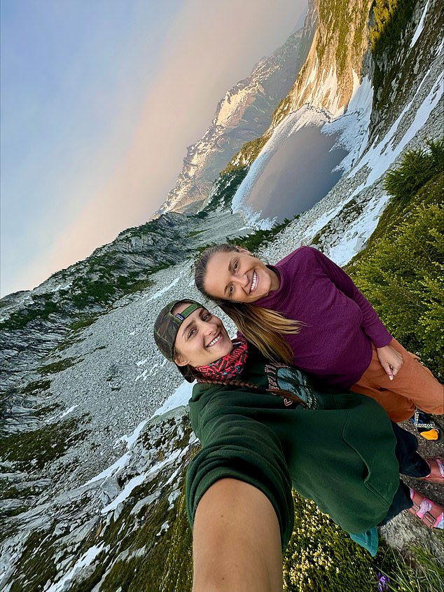 Jessee Clauson (right), 29, and Camille Avarella, 28, were descending Longs Peak in the Rockies when they captured the tall, gray creature on camera