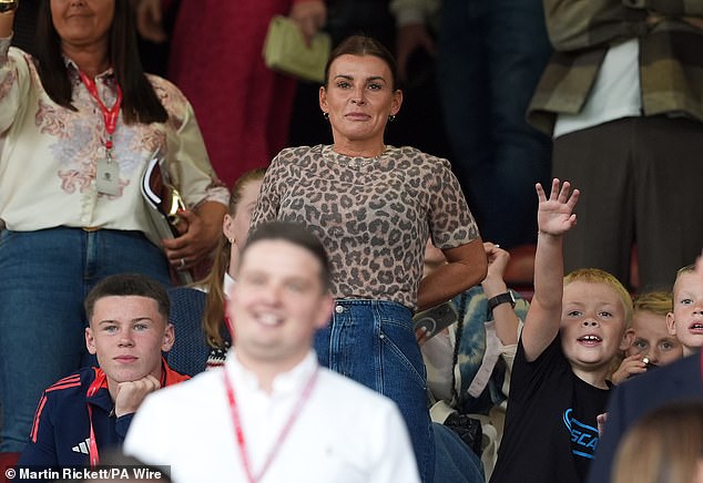 Coleen and her family watched from the stands, beaming with pride as they jumped up to cheer them on from the stands.