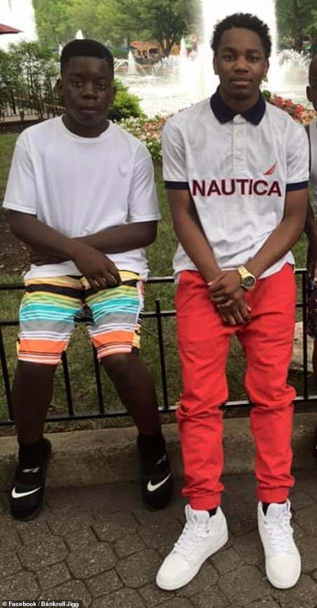 Jezavion (left) as a boy next to his older brother Daveon