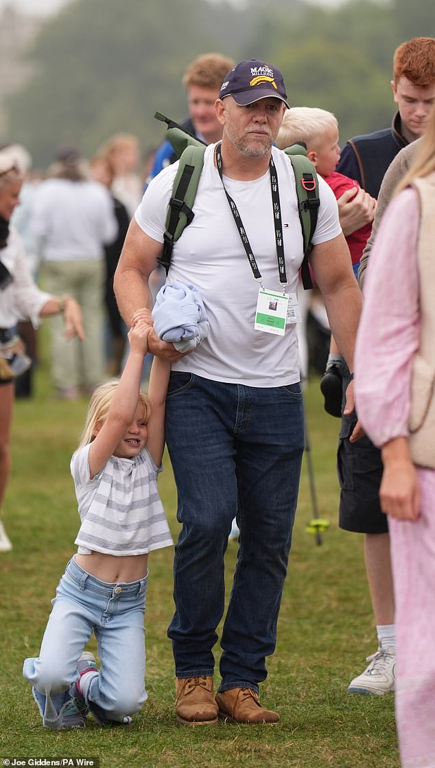 The former rugby player was joined by his daughters Mia, 10, Lena (above), six, and son Lucas, three, at Burghley House near Stamford, Lincolnshire on Saturday afternoon