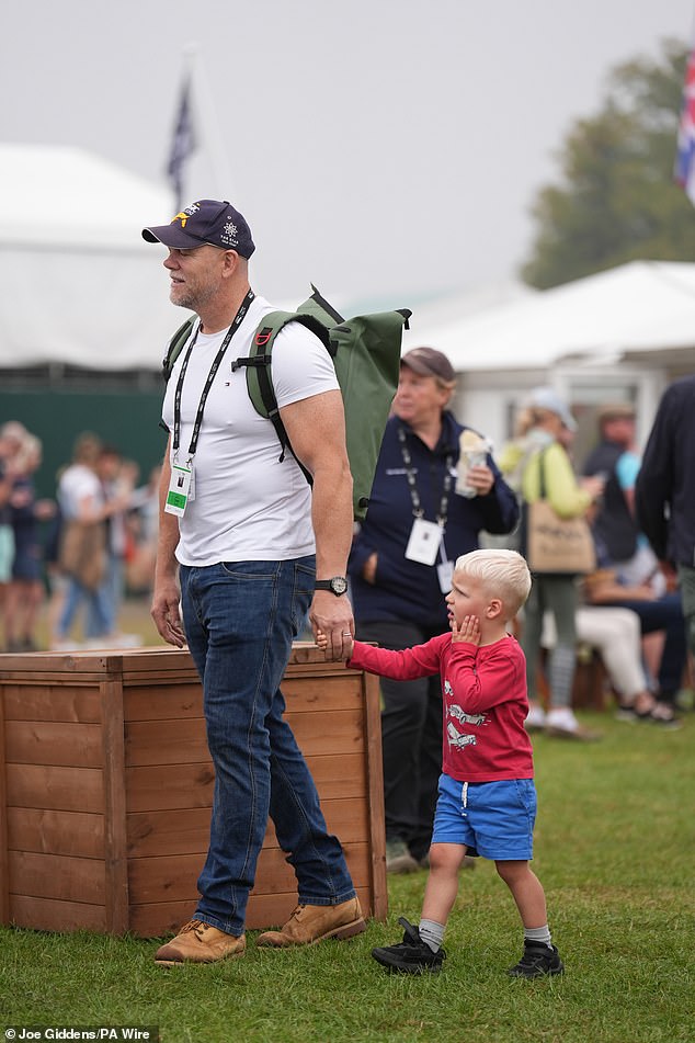 Lena and Lucas were dressed casually for the day, while their older sister Mia was the mini version of her dad in jeans, a T-shirt and a baseball cap