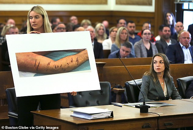 Pictured: Read sits in Norfolk County Court during a preliminary hearing as photos are shown