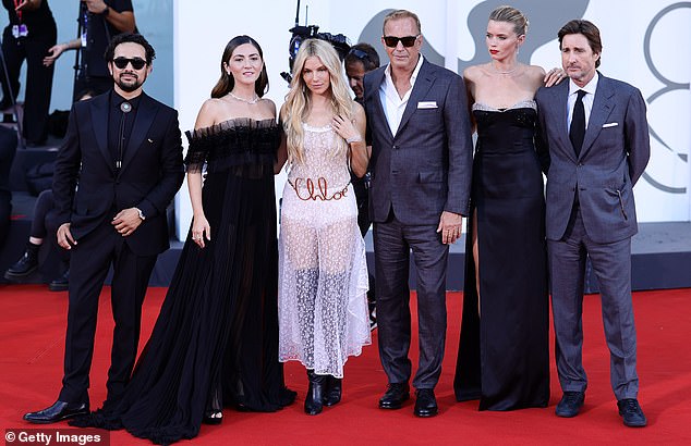 Abbey posed for a group photo on the carpet alongside Alejandra Edda, Isabelle Fuhrman, Sienna Miller, director Kevin Costner and Luke Wilson (left to right)