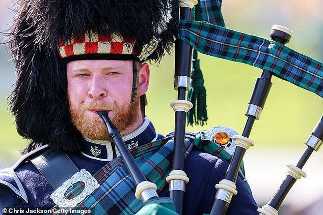 A bagpiper from one of the Massed Pipe Bands performs in the arena during The Braemar Gathering 2024 at The Princess Royal and Duke of Fife Memorial Park on September 7, 2024 in Braemar, Scotland